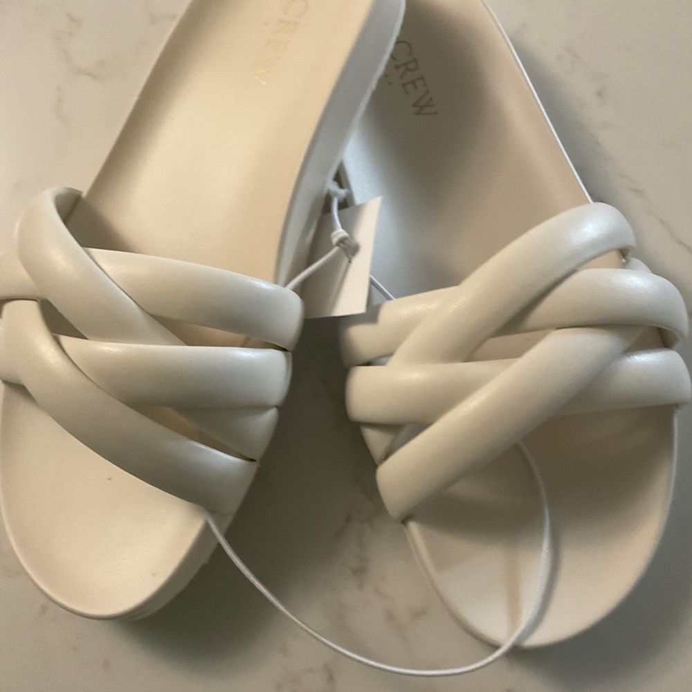 Crisscross slide sandals in Ivory